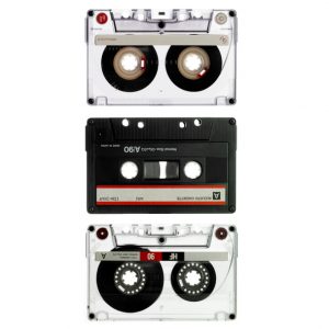 three old cassettes isolated on white